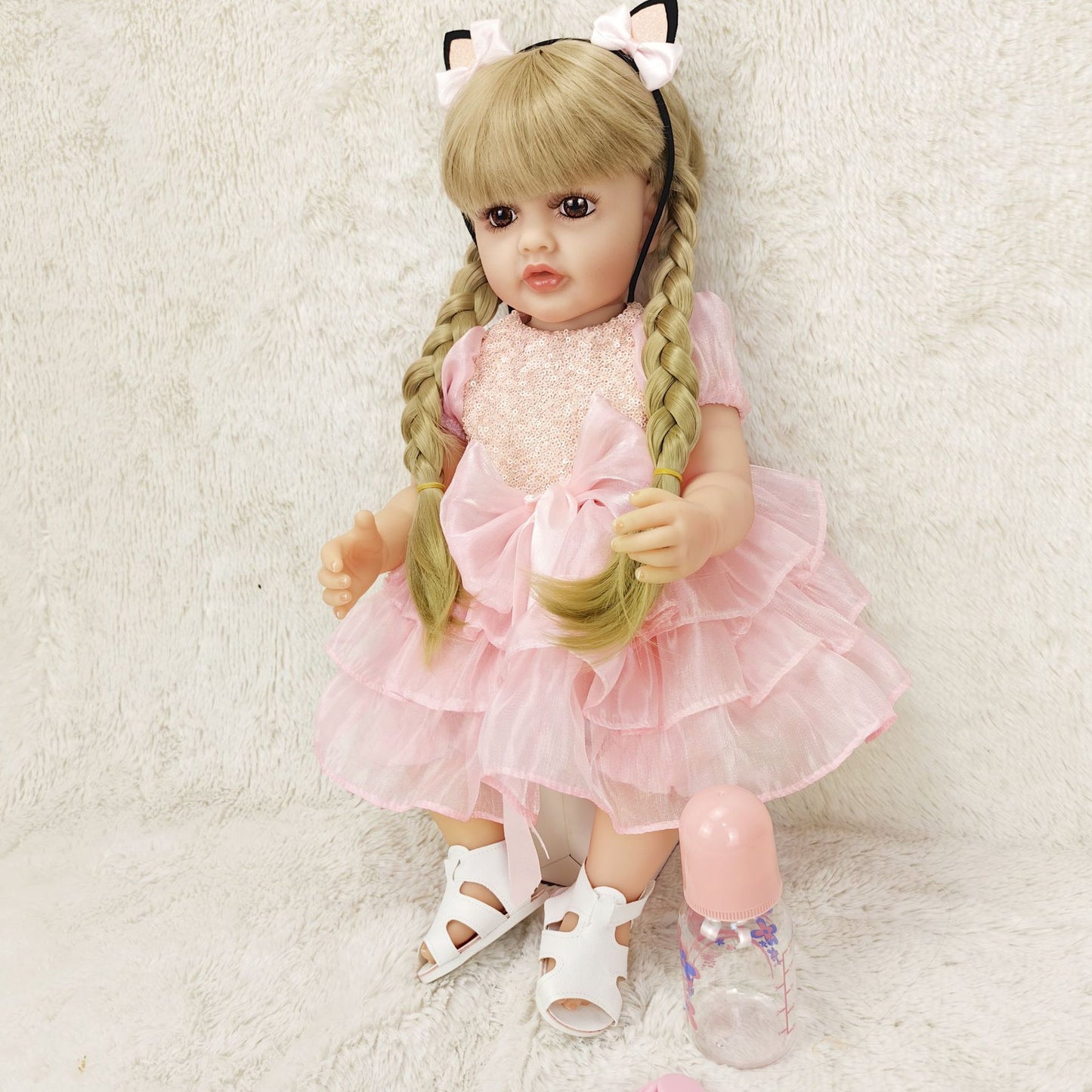 22-Inch Lifelike Reborn Toddler Girl Doll with Soft Silicone Body and Wig Hair - Perfect Gift for Kids
