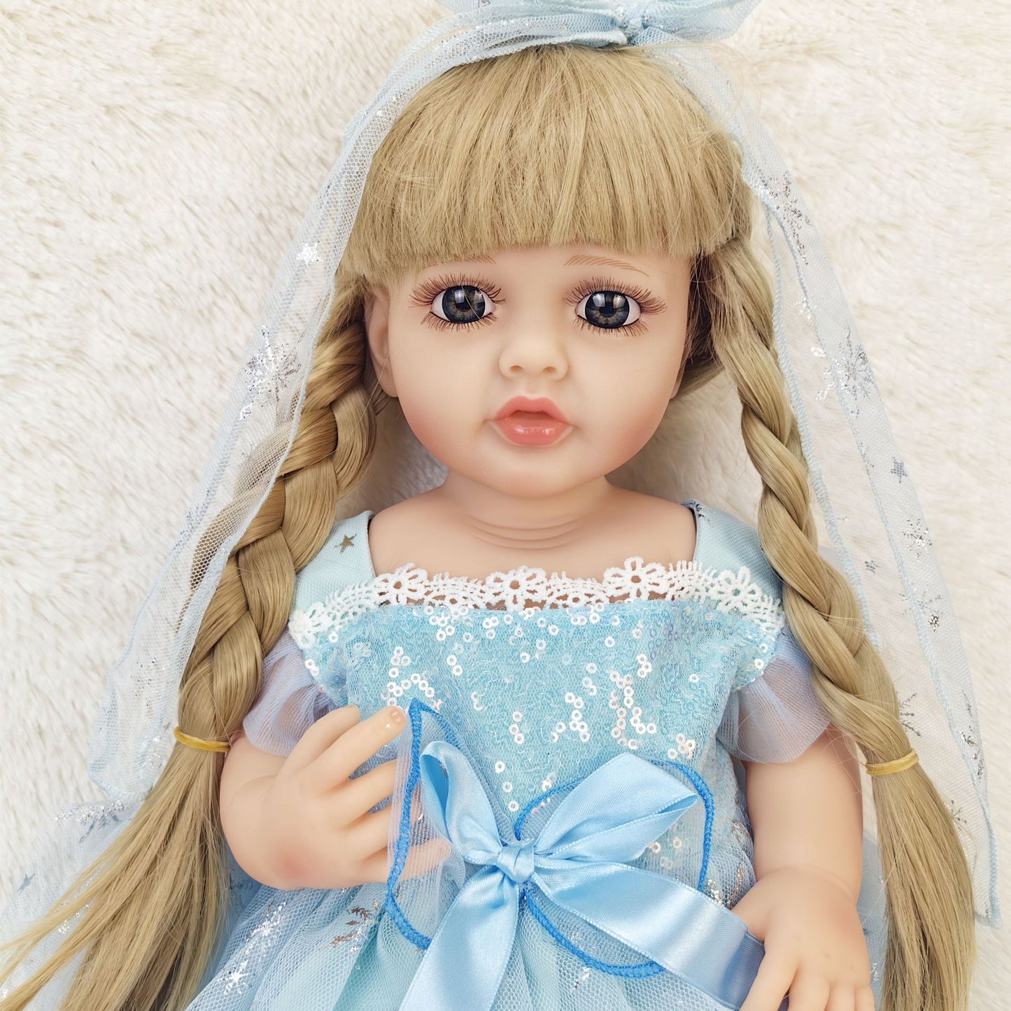 22-Inch Lifelike Reborn Toddler Girl Doll with Soft Silicone Body and Wig Hair - Perfect Gift for Kids