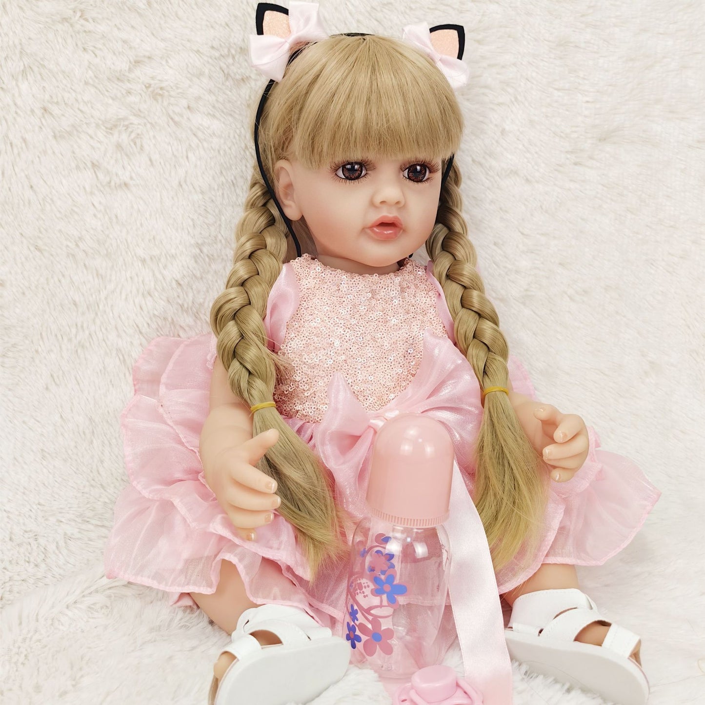 22-Inch Lifelike Reborn Toddler Girl Doll with Soft Silicone Body and Wig Hair - Perfect Gift for Kids