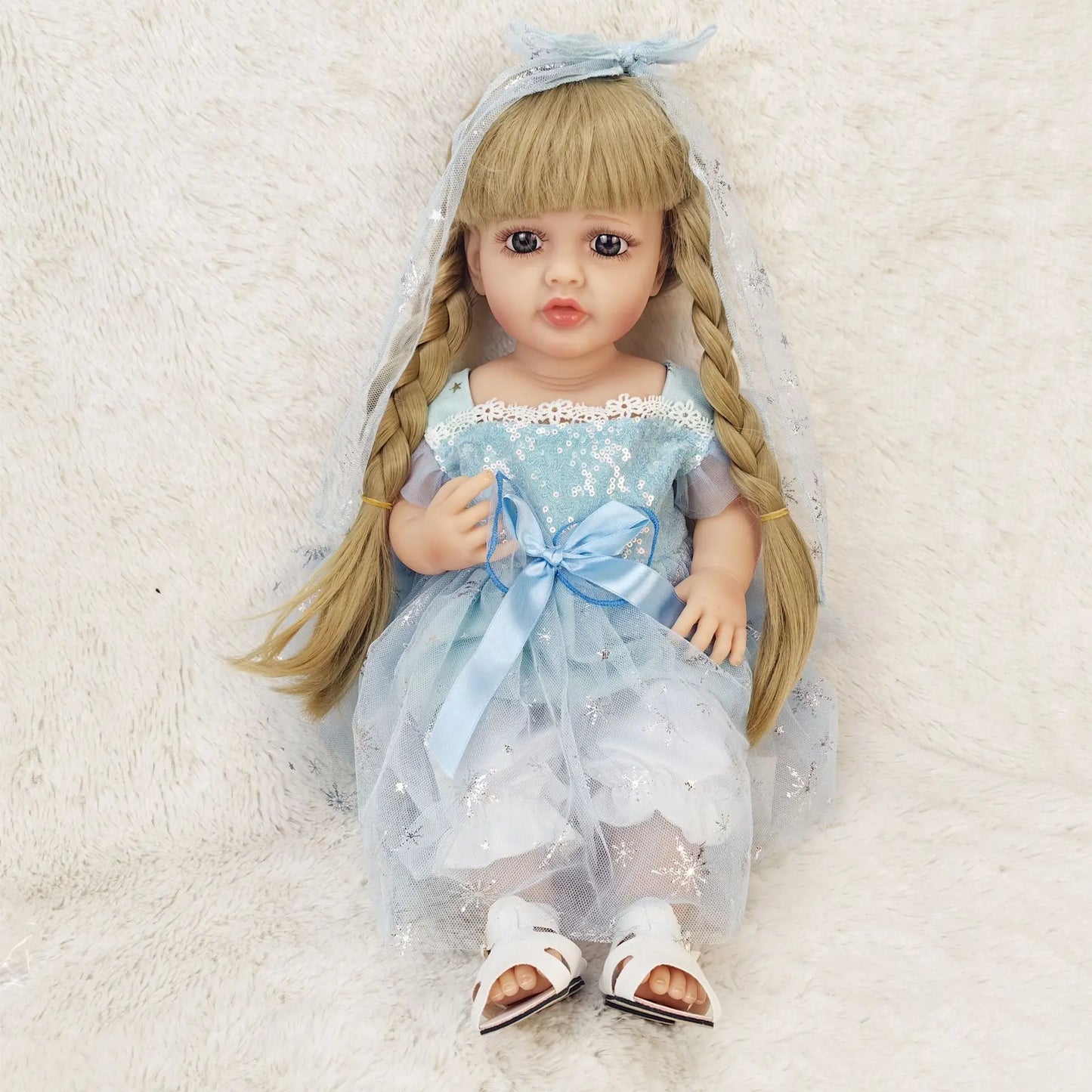 22-Inch Lifelike Reborn Toddler Girl Doll with Soft Silicone Body and Wig Hair - Perfect Gift for Kids