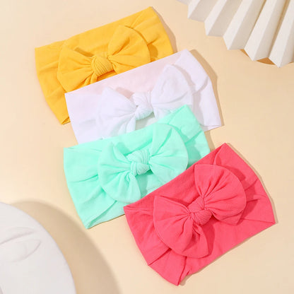 Vibrant Bowknot Hairband for Baby Girls - Elastic Headwear in Candy Colors