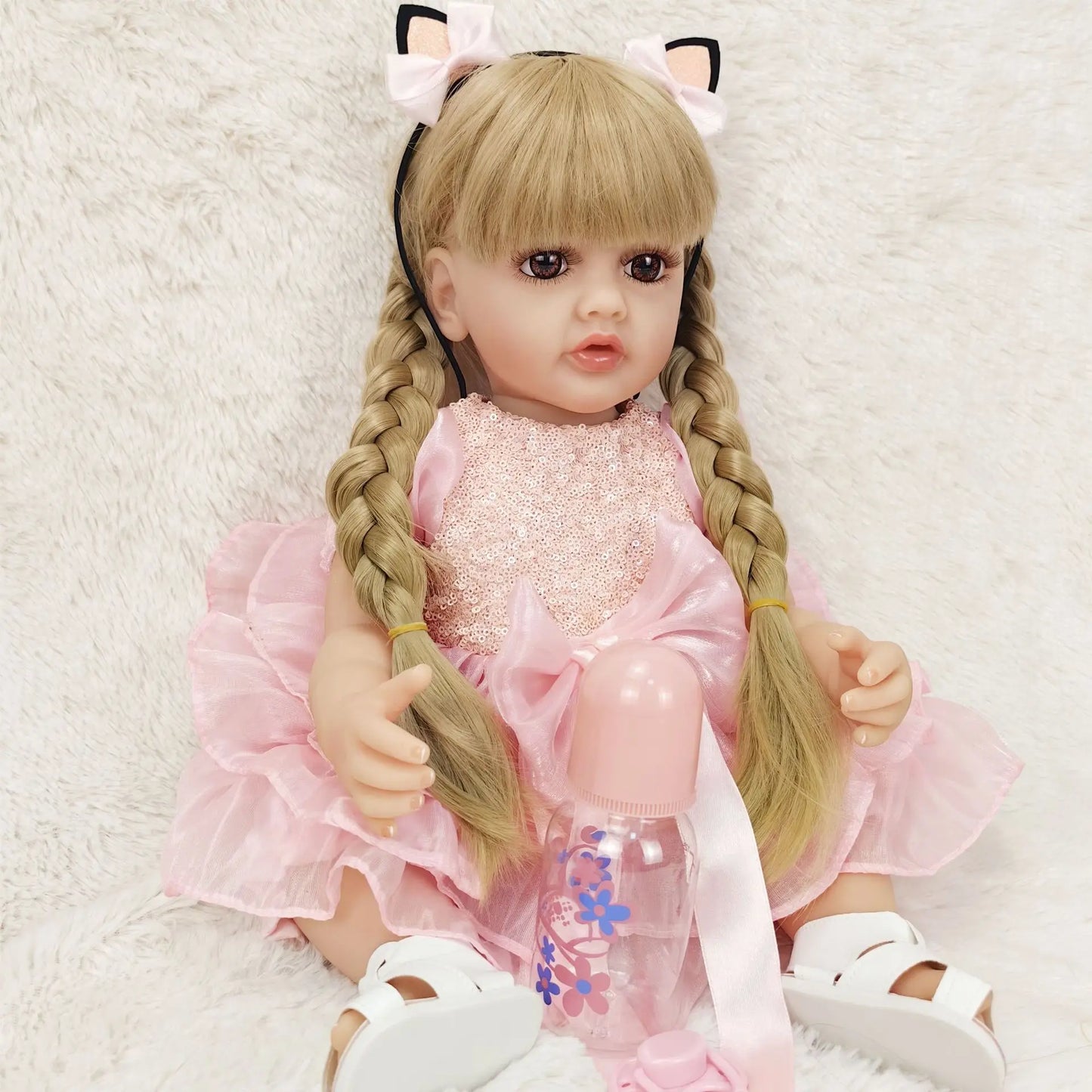 22-Inch Lifelike Reborn Toddler Girl Doll with Soft Silicone Body and Wig Hair - Perfect Gift for Kids