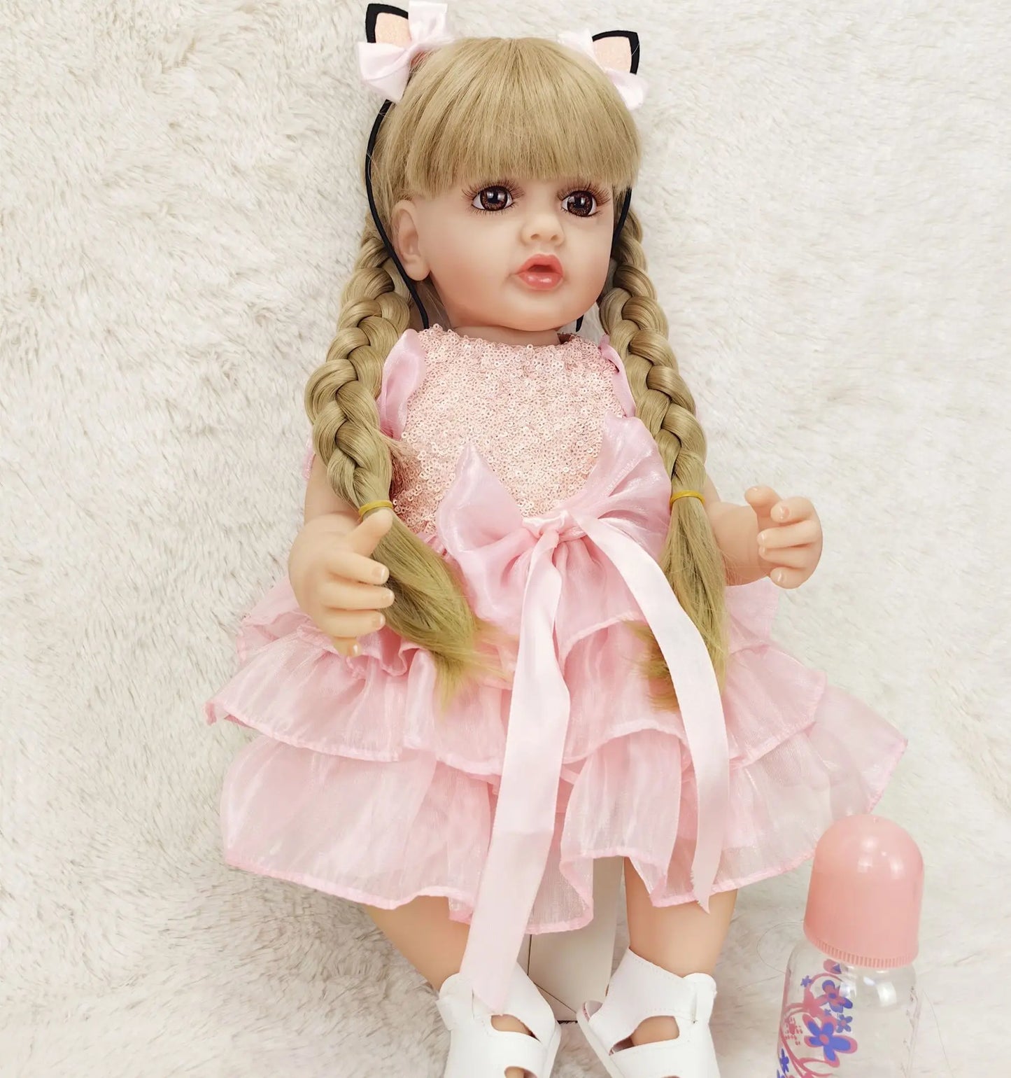 22-Inch Lifelike Reborn Toddler Girl Doll with Soft Silicone Body and Wig Hair - Perfect Gift for Kids